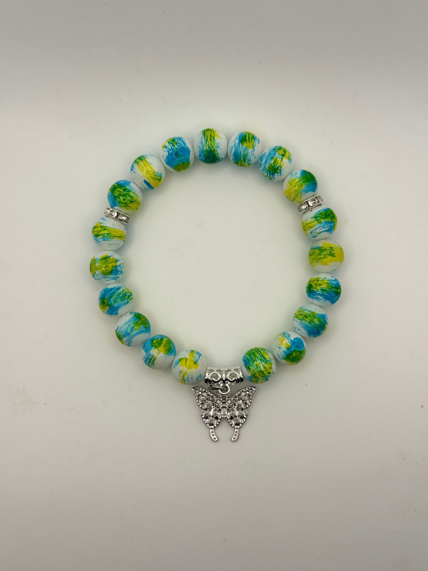 Beaded bracelet with a silver clasp on a white background